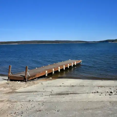 A dock extends into Norfork Lake in northern Arkansas.